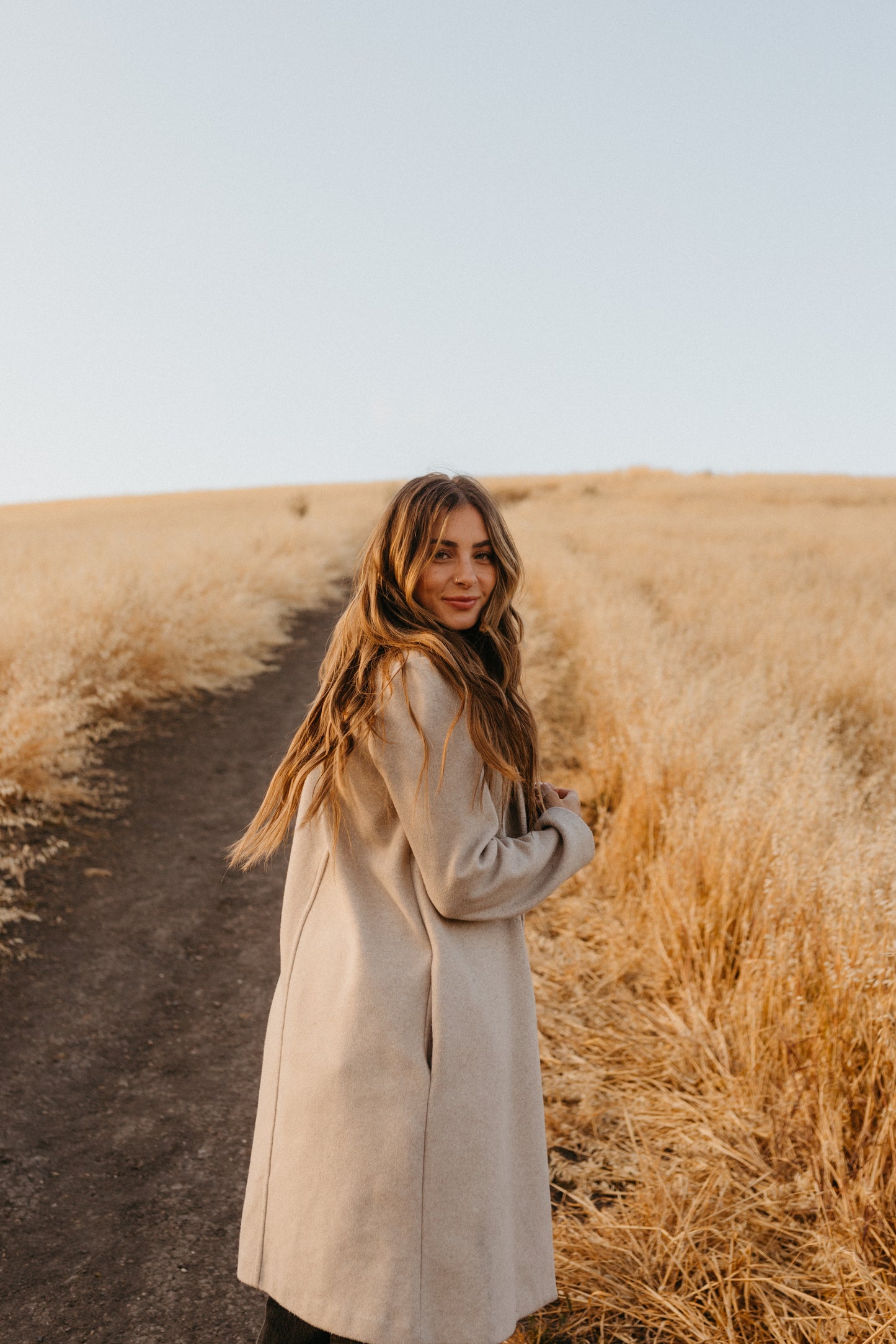 A Model Showcasing Warm Level Six Hair Extensions