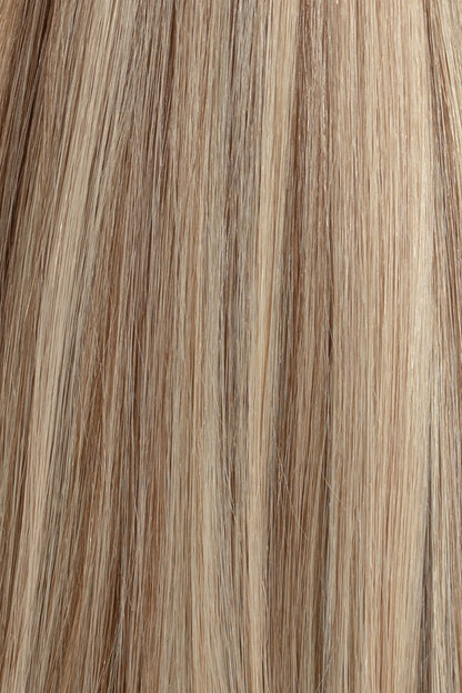 A Neutral Blonde Hair Extension With Level 6 Root And Lowlights